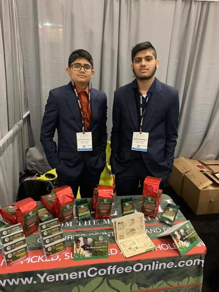Al-Aqeeq booth at a trade show