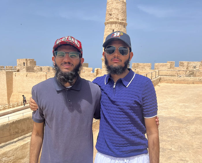 Hasan and Hussain Rangwala traveling together